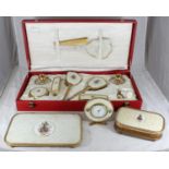 A 1950s Lissco dressing table set including brushes, comb, mirror, candlesticks, atomiser and powder