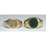 Two various 9ct gold signet rings, one set with an oval dark green stone, the other with engraved