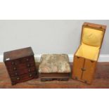 A miniature mahogany chest of drawers, 31cm wide, together with an upholstered rosewood footstool,