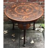 RMS Aquitania Interest: An early 20th century stained mahogany circular table, decorated with