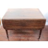 A late Georgian mahogany drop-leaf Pembroke table, with cross-banded top, frieze drawer and opposing