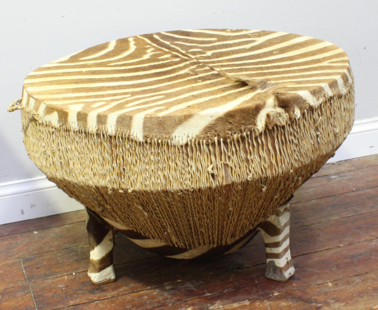 A large antique zebra hide floor drum table believed to be early 20th century with twisted rawhide - Image 6 of 6