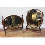 A George III mahogany corner washstand together with two stained-wood toilette mirrors (3)