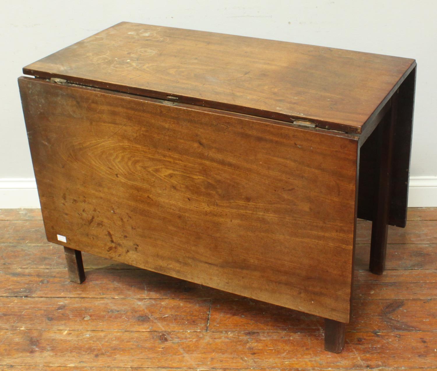 A George III stained mahogany rectangular gate-leg dining table, with two hinged leaves, chamfered - Image 2 of 2