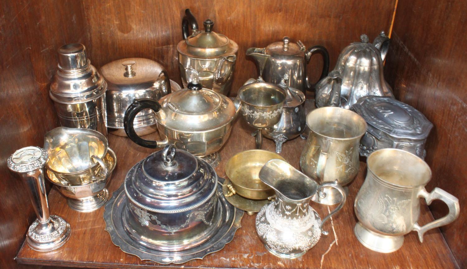 SECTION 54. A quantity of silver-plated wares including assorted tea and coffee pots and tankards