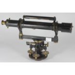 A late 19th/early 20th century black lacquered and brass surveyors level by Troughton & Simms