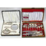 A three-piece silver mirror and brush set (lacking comb), in satin lined box, Birmingham, 1968,