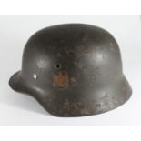 A WWII German double decal Kriegsmarine helmet made by Eisenhuttenwerk Thale, impressed stamp 'ET6?'