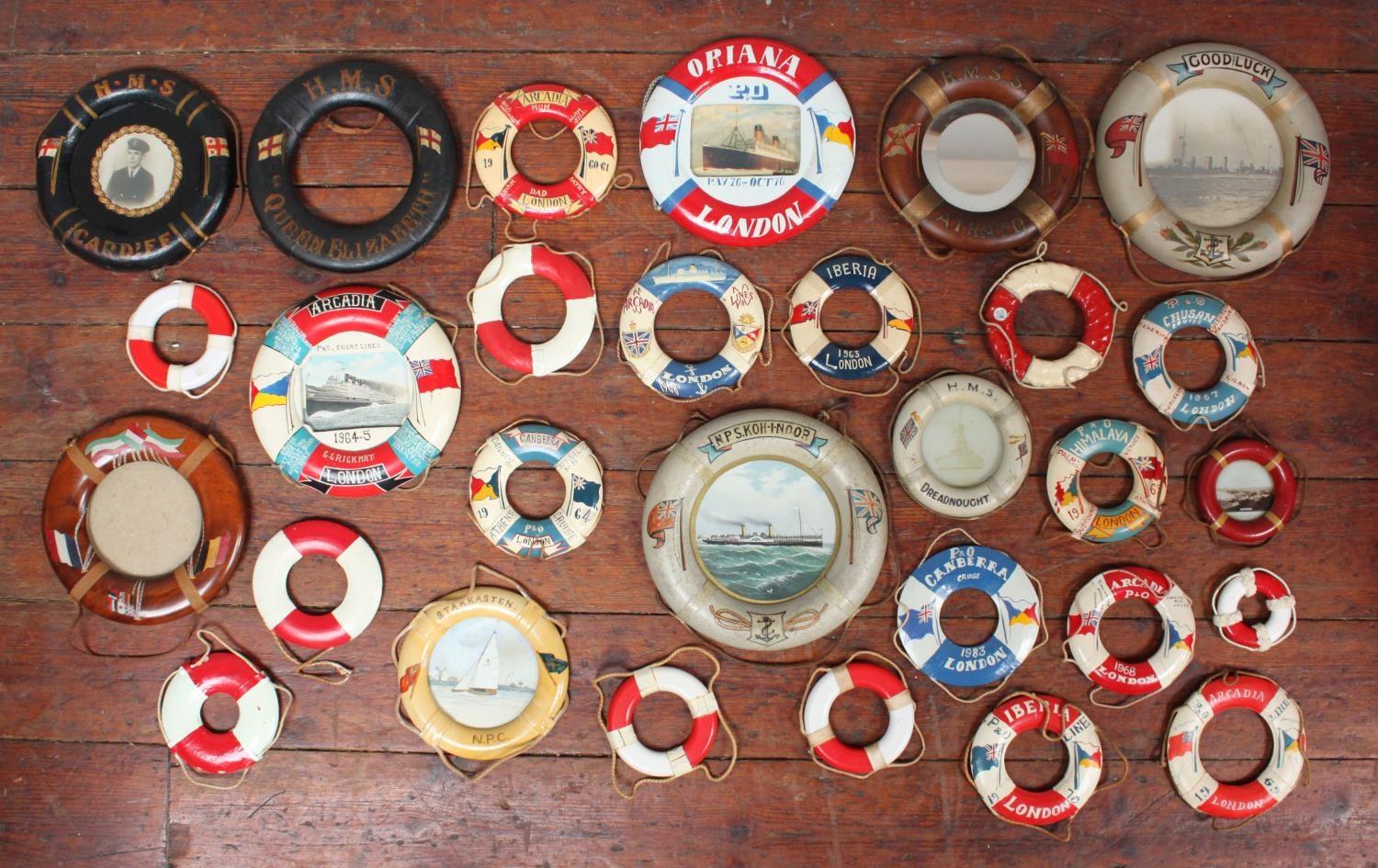 A collection of approximately 82 miniature and commemorative lifebuoys, named examples include HMS - Image 2 of 3