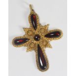 An ornate 15ct gold cross set with cabochon garnets, circa 1870, (af) gross weight 13.6g