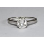 A platinum diamond ring, six claw set with a RBC solitaire diamond, estimated diamond weight