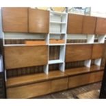 A White & Newton of Portsmouth 1960s white and teak laminate modular sideboard system in two