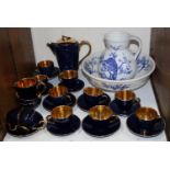 SECTION 27. A Jersey Pottery blue and gilt matched part coffee set, together with a blue and white