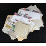 A large collection of assorted loose used world stamps, stamps are organised by country into
