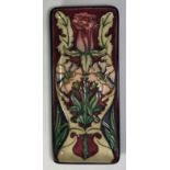 A Moorcroft pottery rectangular tray in the 'Masquerade,' pattern, copyright 2000, leaf date