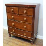 A 19th century stained walnut chest of two short and three long graduated drawers, with turned pulls