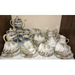 SECTION 6. A Royal Albert 'Tulip' pattern part tea set comprising 2 cake/sandwich plates, 12 cups