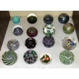 SECTION 24. Sixteen glass paperweights including 11x Perthshire, 2x Orient & Flume, 1x Okra