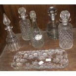 SECTION 36. Five various cut-glass decanters and a porcelain 'Gin' bottle ticket, together with a