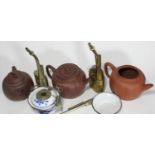 Three assorted Yixing pottery teapots, together with three various opium pipes, one brass, one white