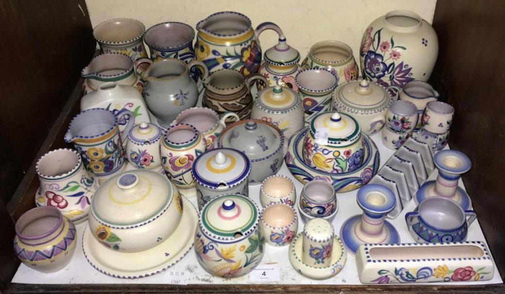 SECTION 4. A large quantity of Poole pottery including vases, jugs, preserve pots, egg cups, pair of