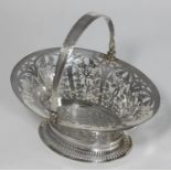 WITHDRAWN A .900 grade Continental silver bon bon basket, The body with pierced, floral decoration