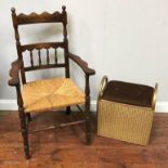 A Lloyd Loom labelled linen basket, together with a rush seated spindle back chair (2)