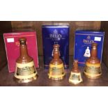 Three full Bell's Extra Special Old Scotch Whisky boxed ceramic decanters: Golden Jubilee 1952-2002,