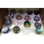 SECTION 23. Sixteen glass paperweights including 7x Caithness, 2x Whitefriars 1x Wedgwood etc