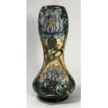 A limited edition Moorcroft pottery vase, of double-gourd shape and decorated in the 'Montana'