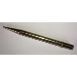 A 9ct gold propelling pencil by J M & Co. the shaft with engraved initials 'P. M. E', gross weight