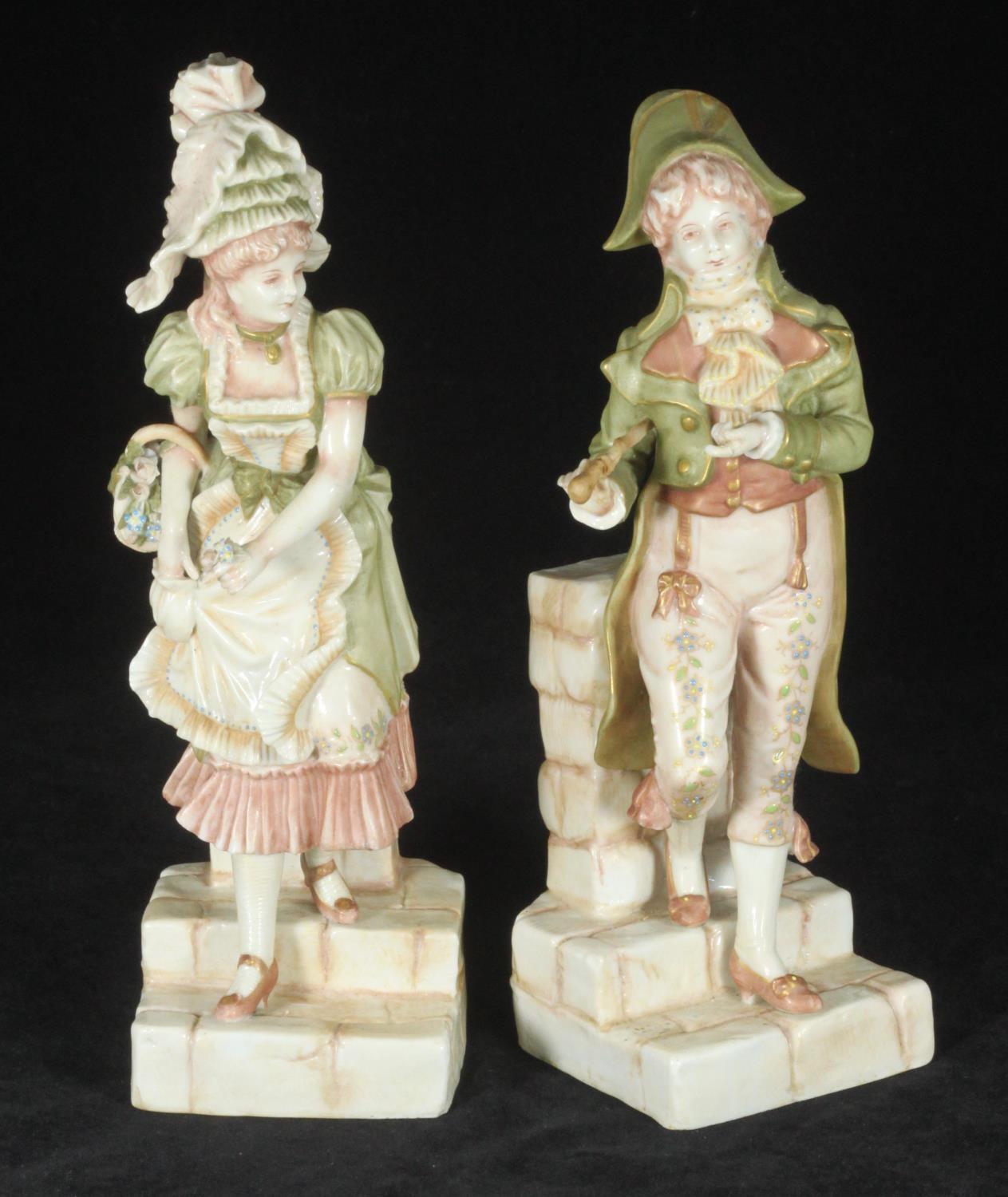 A pair of Ernst Bohne and Sohne porcelain figures of a finely dressed gentleman, and a lady