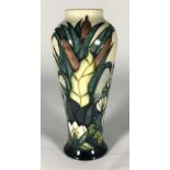 A Moorcroft pottery vase, of inverted baluster form, decorated in the 'Lamia' pattern designed by