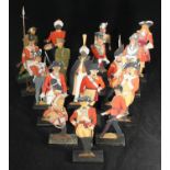 Seventeen hand-painted plywood profile figures of British Soldiers of the Royal East Kent