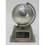 A novelty LCD Digital 'globe' desk alarm clock, with 24x red lights positioned on various cities