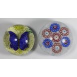 Two limited edition Baccarat Glass paperweights, A butterfly 45/125 dated 1978, and Millifiori,