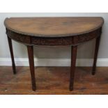 A pair of late 19th Century Anglo-Indian rosewood demi-lune side-tables, in the Robert Adam style,