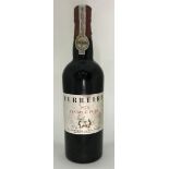 A bottle of Ferreira 1970 vintage port, signs of some seepage, in original branded tissue wrapper