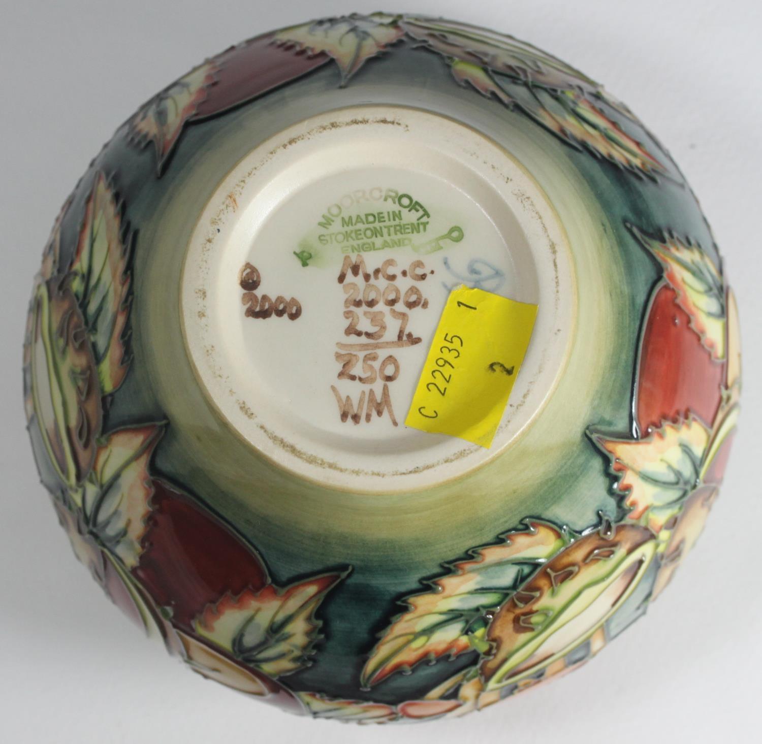 A boxed Moorcroft vase in the 'Mushroom and Conkers' pattern, of globular form, with date symbol - Image 3 of 3