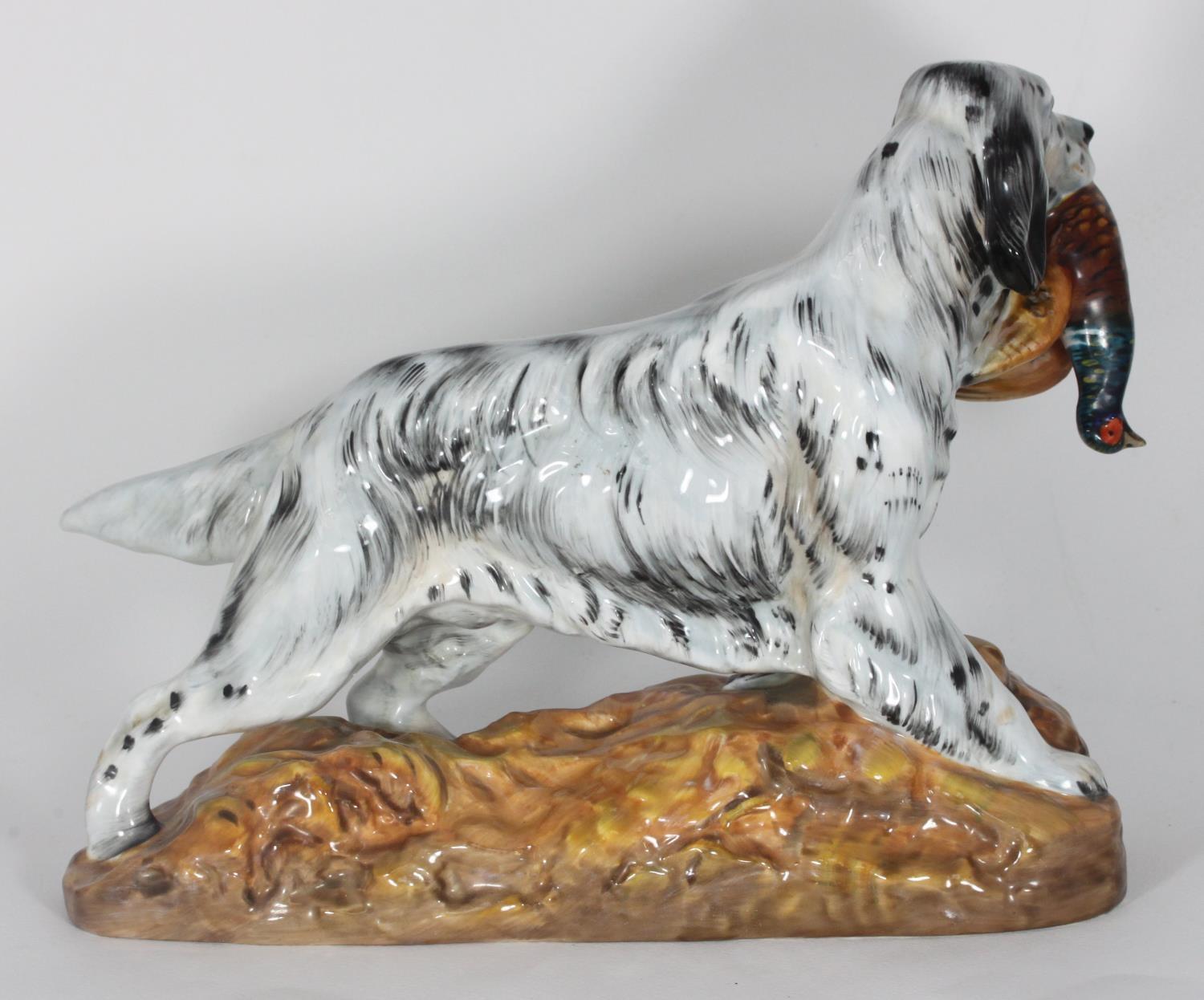 A Royal Doulton figure modelled as an English Setter with a Pheasant, raised on naturalistic - Bild 2 aus 2