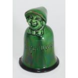 A William Baron Barnstaple pottery Suffragette bell, finished in a green glaze and inscribed '