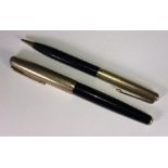 A rare Parker 51 fountain pen & pencil set, c.1940's, each with 14K solid gold 'Heirloom' caps in