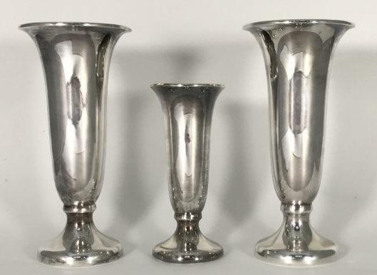 A pair of silver-plated spill vases, numbered KF18089, together with a smaller example numbered