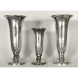 A pair of silver-plated spill vases, numbered KF18089, together with a smaller example numbered
