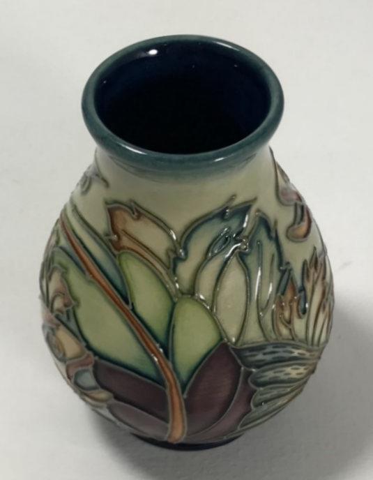 A Moorcroft pottery small vase of ovoid form, decorated in the 'Trout' pattern after Philip - Image 4 of 4