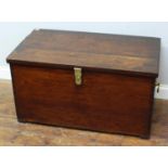 A late 19th/early 20th century stained teak coffer, rectangular form with hinged top, brass side