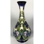 WITHDRAWN: A limited edition Moorcroft pottery vase, of onion form and decorated in the 'Wolfsbane'