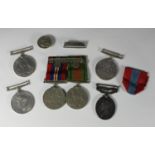 A small collection of assorted un-named WWII medals including the 1939 - 1945 Defence medal and