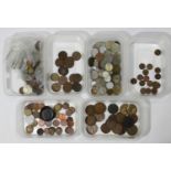 A collection of assorted loose, circulated mixed world coinage, largely pre-decimal, including