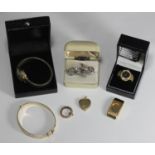 A small collection of assorted costume jewellery and gold-plated items comprising a ladies Raymond